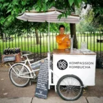 Kompassion Kombucha park tasting bike